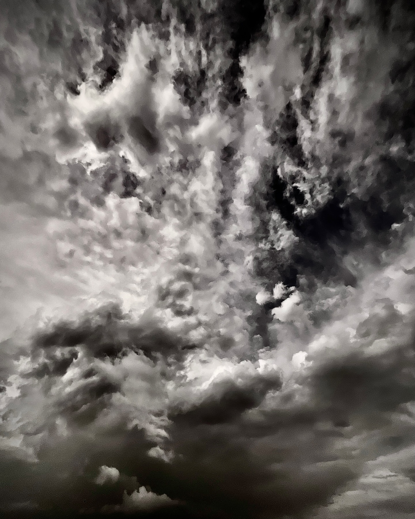 Photograph by Chuck Thurston: Afternoon cloud drama